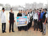 Rally on International Aids Day by N S S Volunteers under guidance of Principal Dr. B. S. Chikte